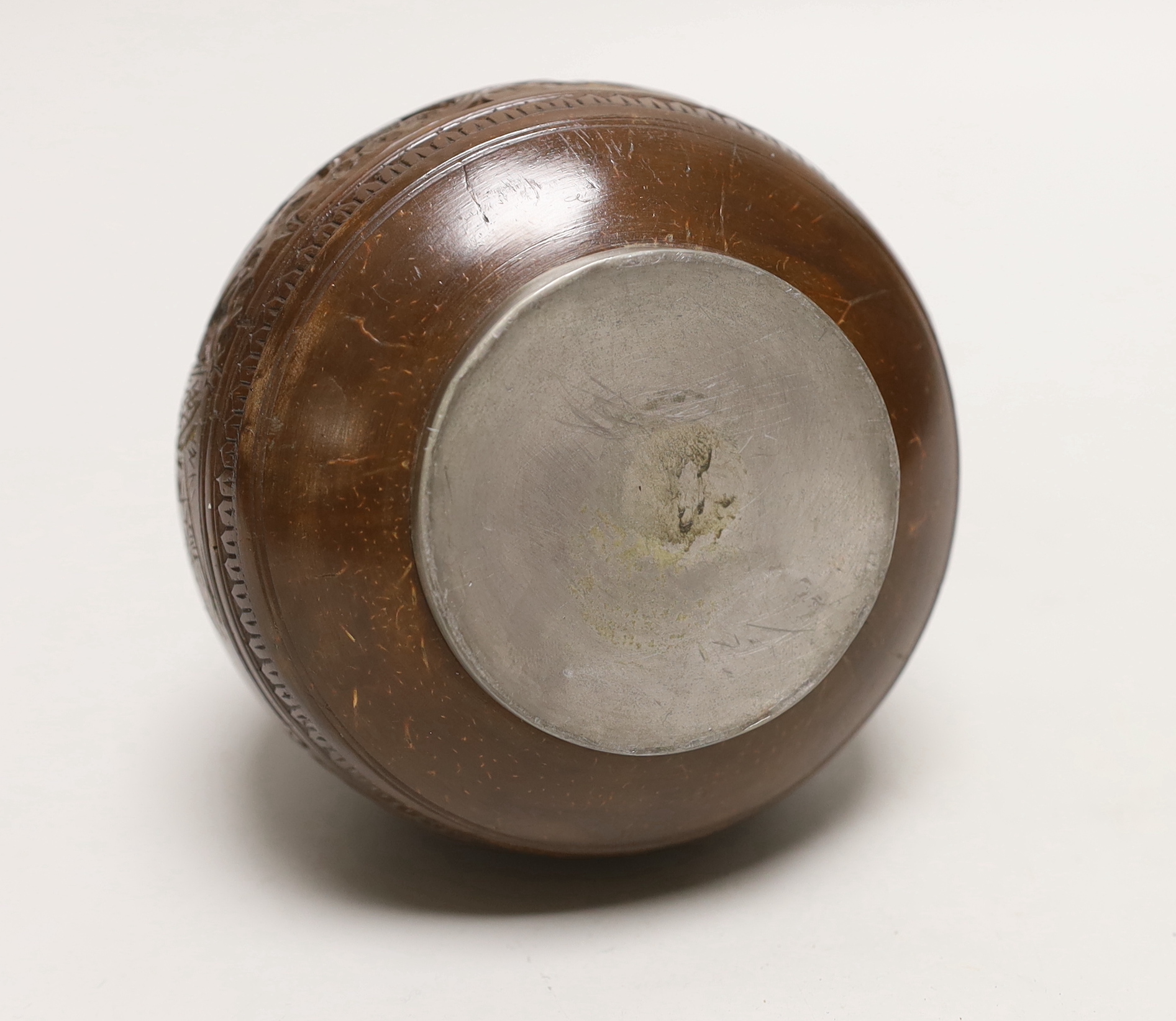 A Chinese coconut and pewter vase, 14cms high